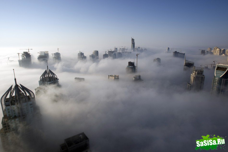 Дубай растет: вид с воздуха на город в пустыне (12 фото)