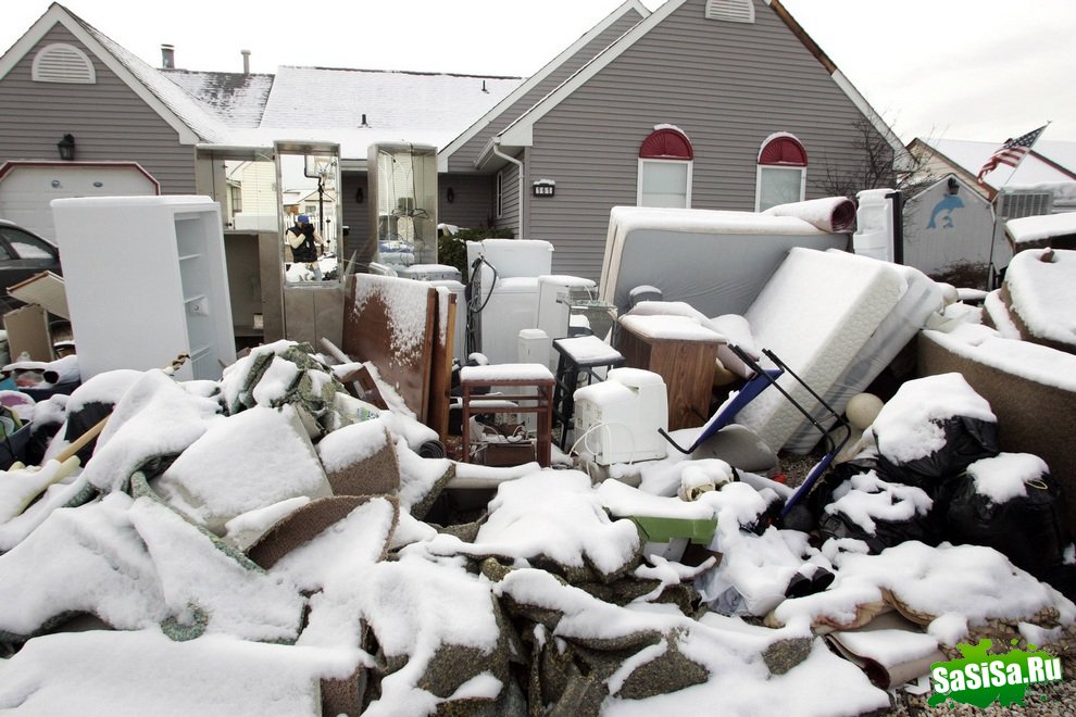 Новый ураган в США пришёл со снегом (11 фото)